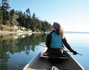 Woman canoeing in the Great Outdoors
