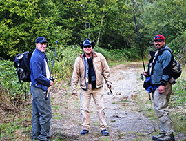 Three men preparing to fish near Roslyn, Washington